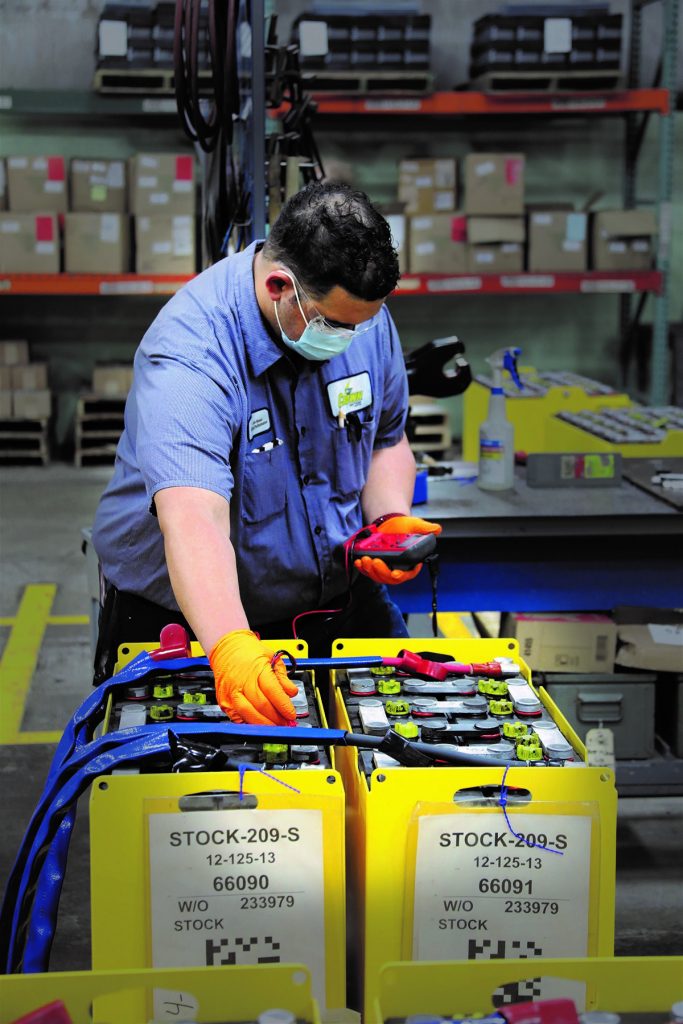 Crown Battery plant Safe + Sound Week employee working at Crown Battery plant
